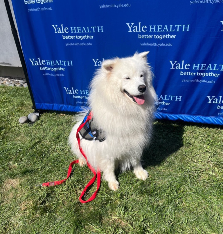 Laika Blue posing for a photo at Yale Health event